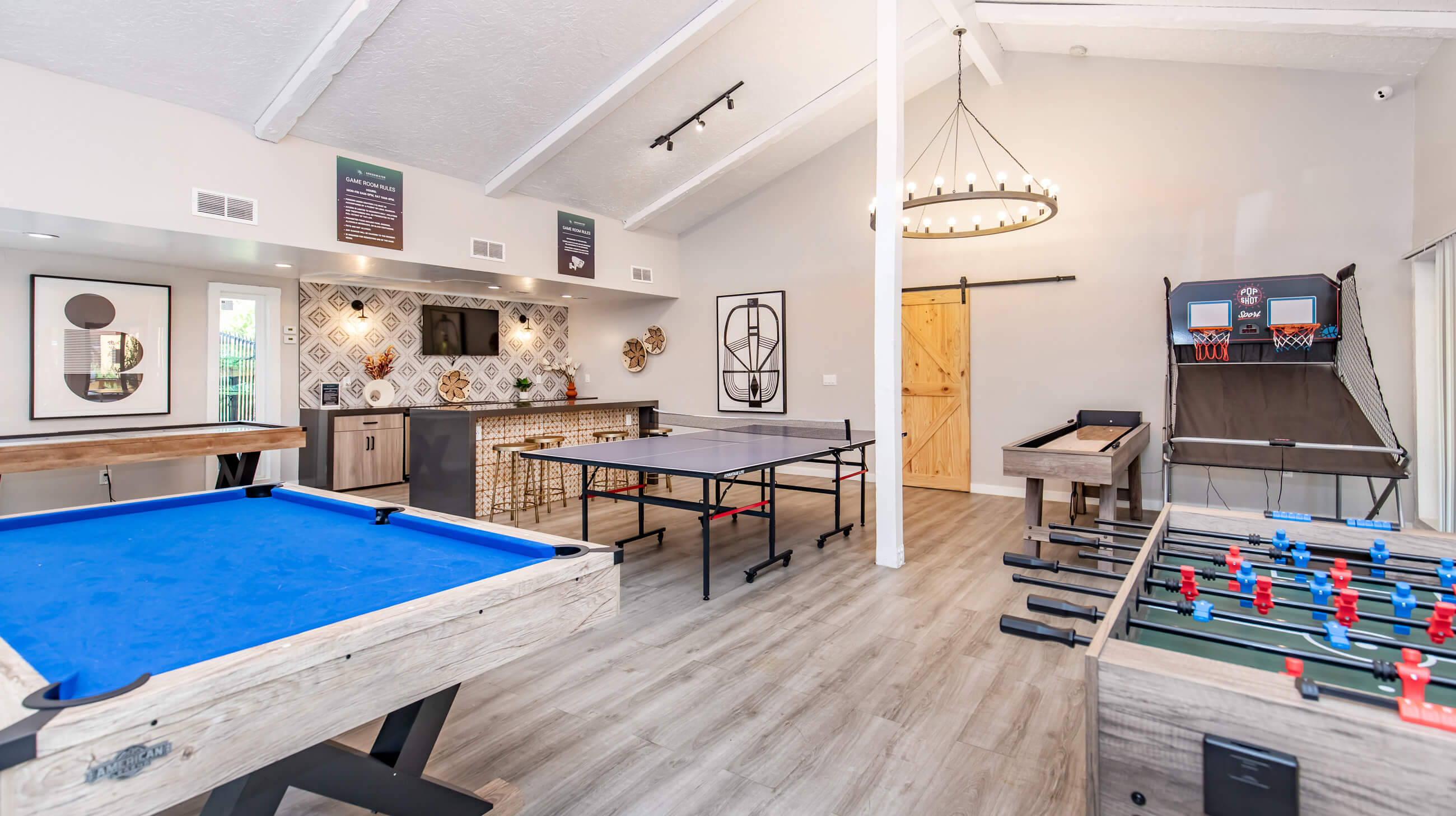 Apartment pool with lounge chairs